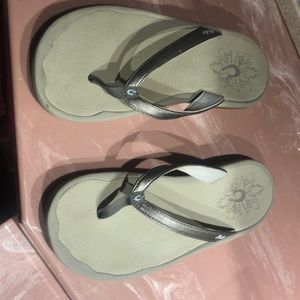 OluKai flip flops